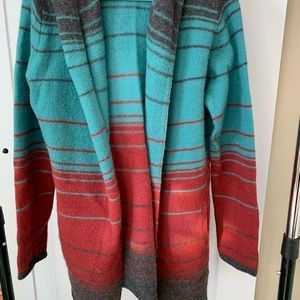 Horny Toad sweater. Turquoise, red and gray. Has some pilling. Very warm.